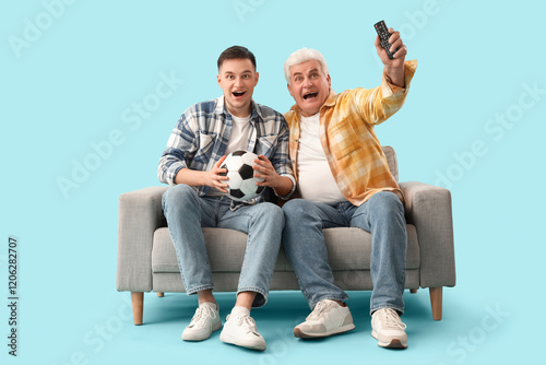 Happy young man with his fa...