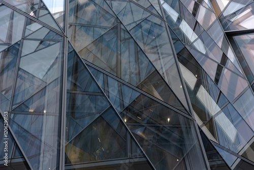 Obraz na plátně Abstract patterns and background through refections of a glass building fasade
