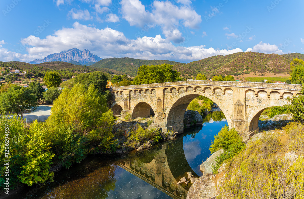 Landscape with Ponte Leccia village and Monte Cinto in Corsica island, France