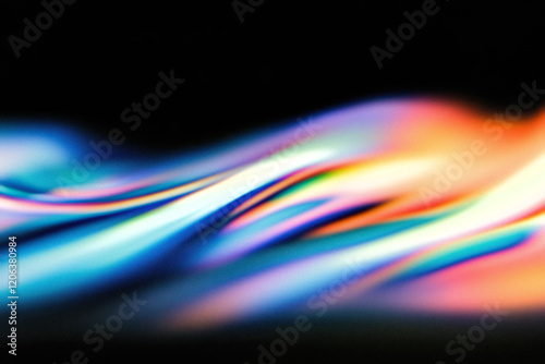 Colorful light trails flowing smoothly in the dark