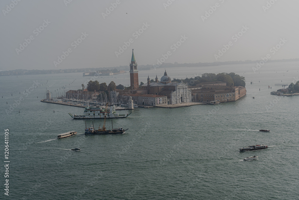 Venice. Aerial view. Many boats sail in different directions along the canal.