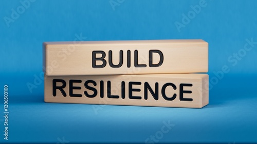 Build resilience symbol. Wooden blocks with words Build resilience. Business and Build resilience concept.3D rendering on blue background.