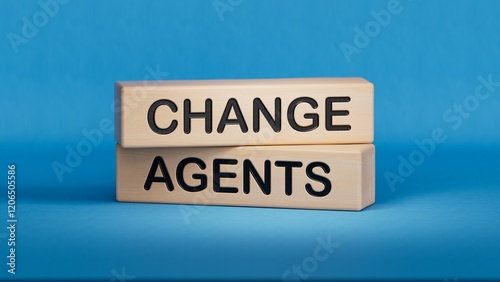 Change agents symbol. Concept word Change agents on wooden blocks.Business and Change agents concept. Copy space.3D rendering on blue background.