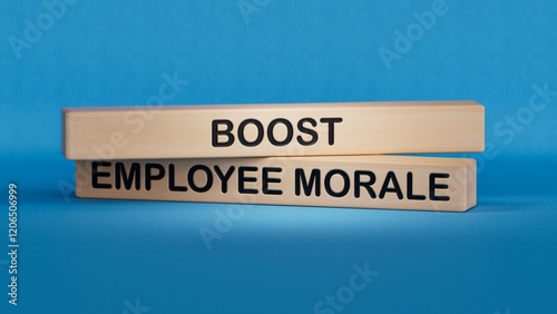 Text BOOST EMPLOYEE MORALE. Wooden cube blocks. Copy space.3D rendering on blue background.