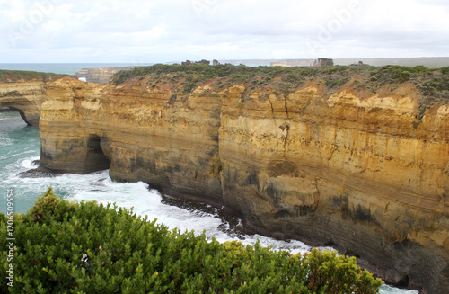 Cliff rock formation and the ocean at Loch Ard Gorge on the Great Ocean Road in Victoria, Australia photo