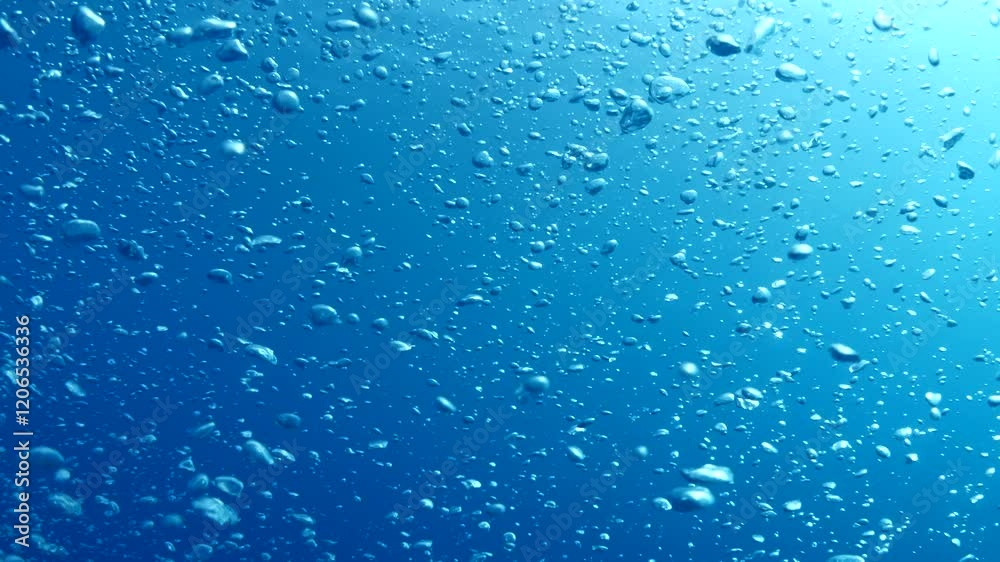 air bubbles slow  underwater coming up scenery dark blue and sun shine ocean scenery from scuba  divers backgrounds