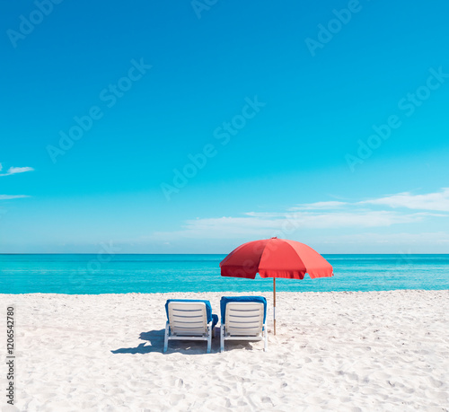 beach umbrella and lounge chair in miami florida