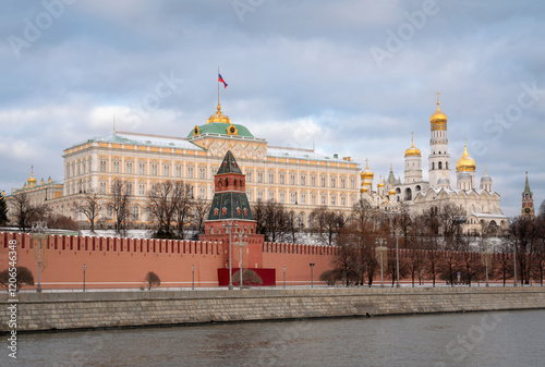 View of the building of the Grand Kremlin Palace, the Annunciation Tower and the ensemble of the Kremlin Cathedral Square from the embankment of the Moskva River, Moscow, Russia