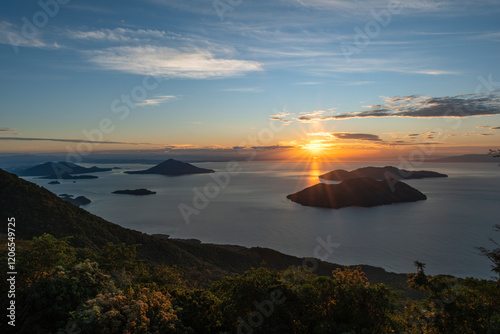 View of Fonesca Gulf and La Union Bay from the top of Conchagua Volcano observation platform at sunrise hour in El Salvador. The place were borders of Honduras, Nicaragua and El Salvador meet.