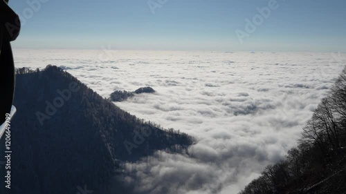 Amazing cloud formations over Gebele city, surrounded by the Caucasus Mountains in early winter evening. Azerbaijan photo