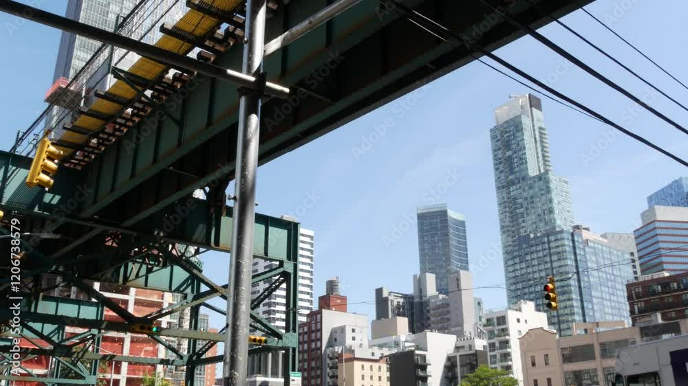 New York elevated subway, metropolitan bridge, metro track above street. Railway transport over road. Railroad line. Queens public transportation. Long Island city skyline, United States cityscape. New York elevated subway, metropolitan bridge, metro track above street. Railway transport over road. Railroad line. Queens public transportation. Long Island city skyline, United States cityscape.