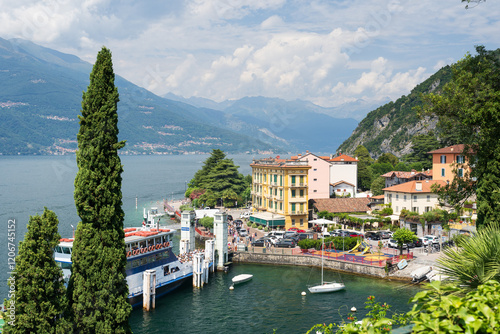 A ferry disembarking passengers in Varenna, a town along Lake Como, Italy photo