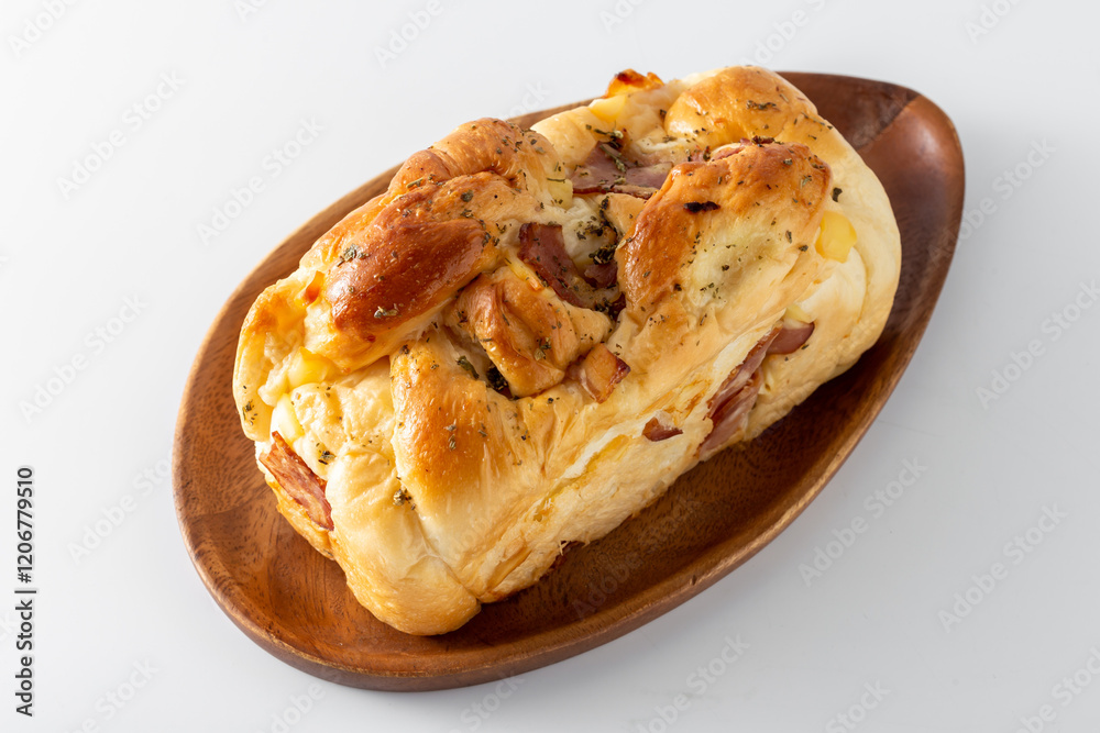 Hotdog bun with ham and cheese on white background Hotdog bun with ham and cheese on white background