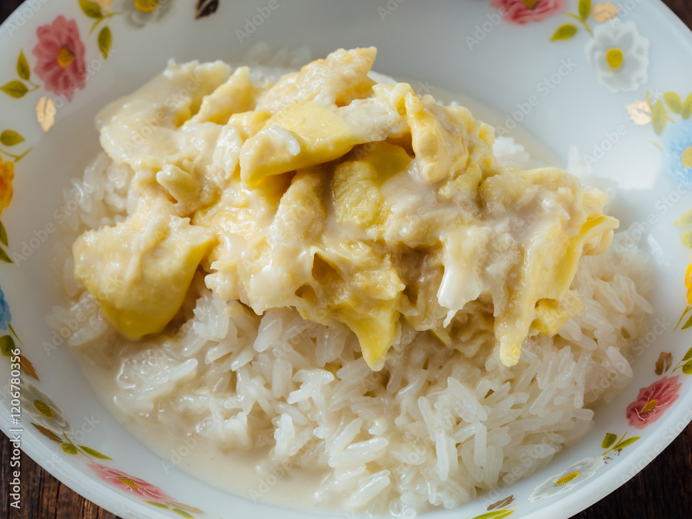 Sticky rice with durian on wooden background Sticky rice with durian on wooden background