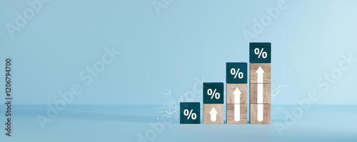 Interest rate and dividend concept, wooden block with percentage symbol and up arrow, return on stocks and mutual funds, long term investment for retirement.