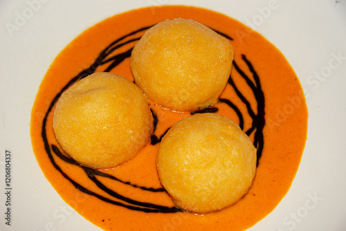 Parmesan Spheres in Roasted Pepper Sauce photo