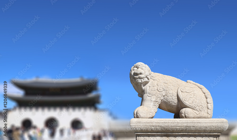 A stone statue of a mythical creature at the Gwanghwamun Gate of Gyeongbokgung palace, Seoul, South Korea A stone statue of a mythical creature at the Gwanghwamun Gate of Gyeongbokgung palace, Seoul, South Korea