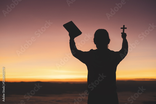 Photography silhouette of a man Praying hands with faith in religion and belief in God On the morning sunrise background
