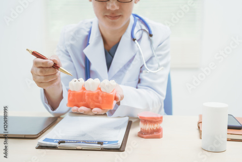 Male doctor treating dental diseases at a hospital, discussing tooth decay, crooked teeth broken teeth,cracked teeth, gum inflammation, and wisdom tooth pain, providing treatment plans, patient care
