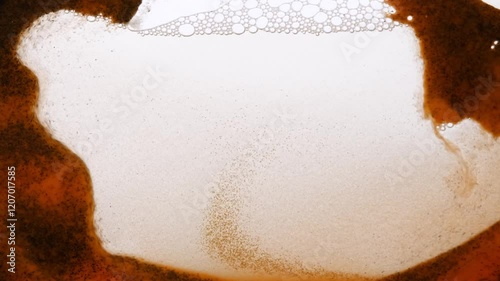 sand particles and bubbles flowing in liquid