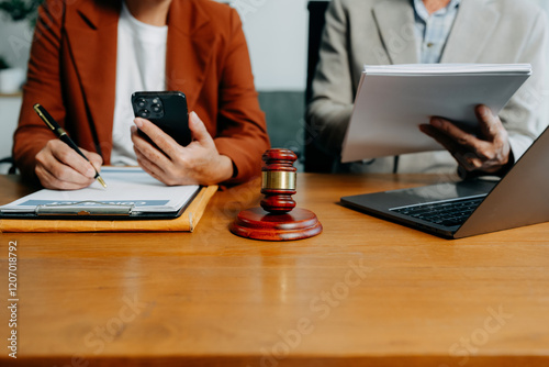 Businessman and Male lawyer or judge consult having team meeting with client, Law and Legal services concept in office.