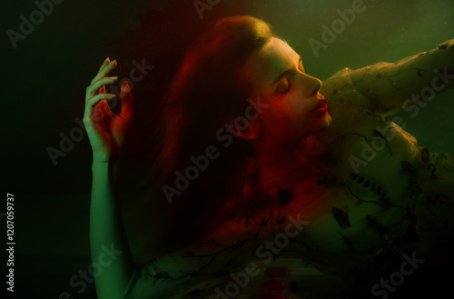Young blond woman under water