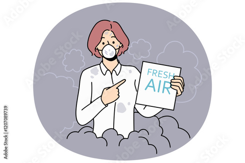 Woman suffers from air pollution and shows paper with inscription fresh air standing in protective mask. Problem of environmental pollution due to coal plants and carbon emissions.