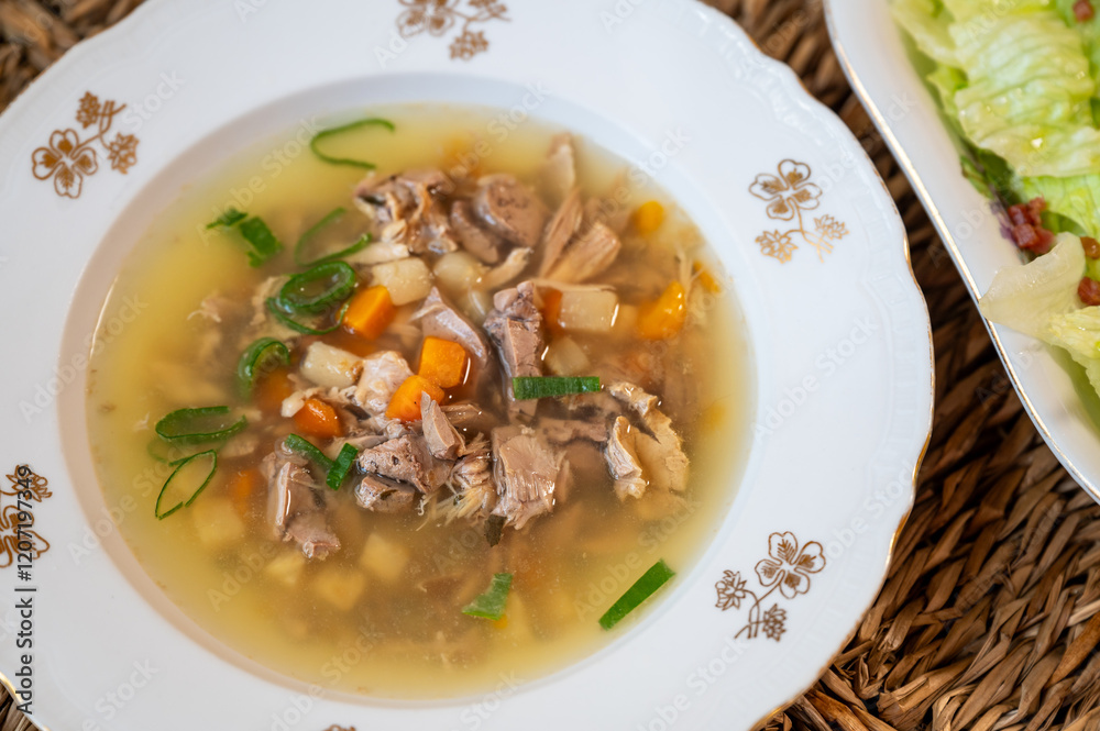 Rabbit soup with vegetable in plate. Rabbit soup with vegetable in plate.
