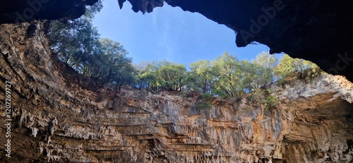 Melissani lake cave the hole seen from inside the cave, Kefalonia island Greece 