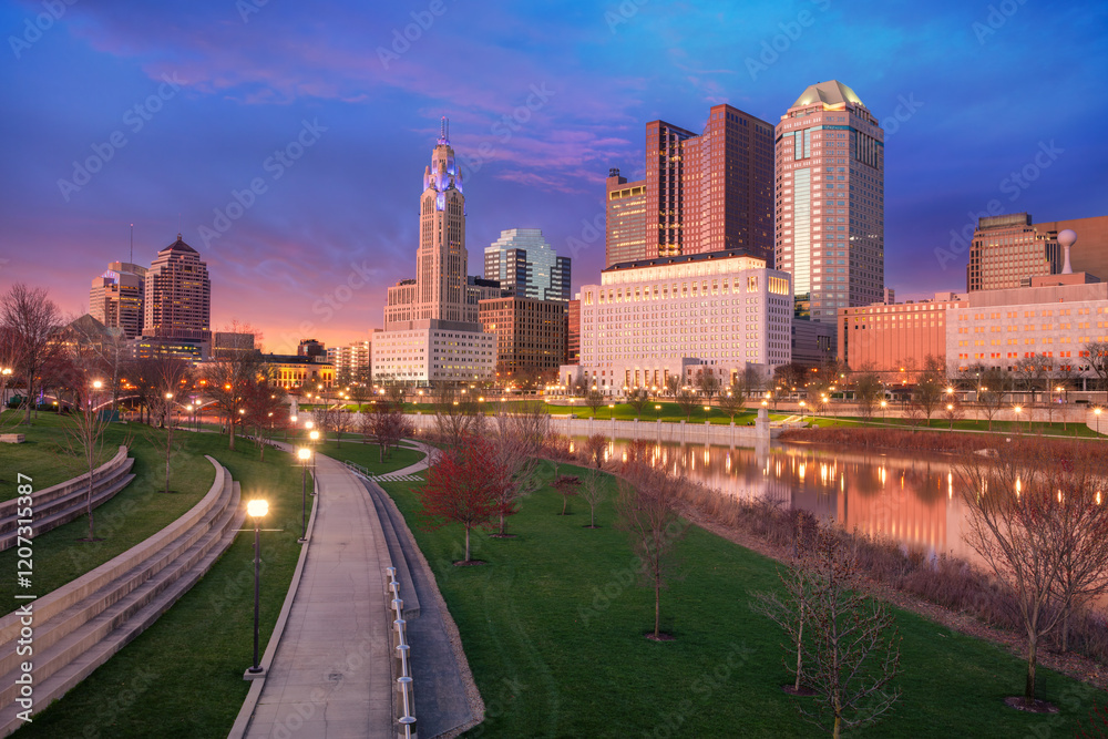 Columbus, Ohio, USA. Cityscape image of Columbus, Ohio, USA downtown skyline with the reflection of the city in the Scioto River at spring sunset.