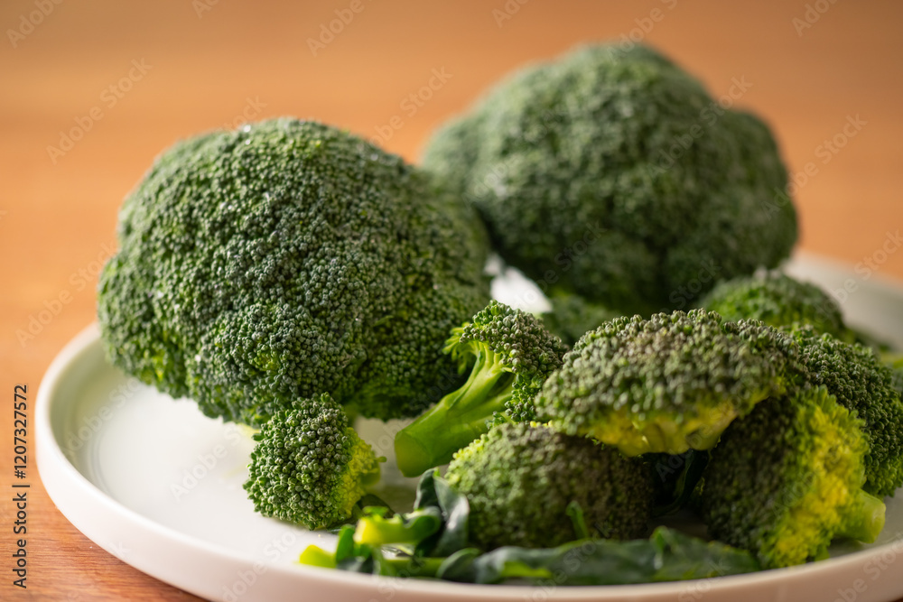 Fresh broccoli on the table.
Fresh broccoli on the table.