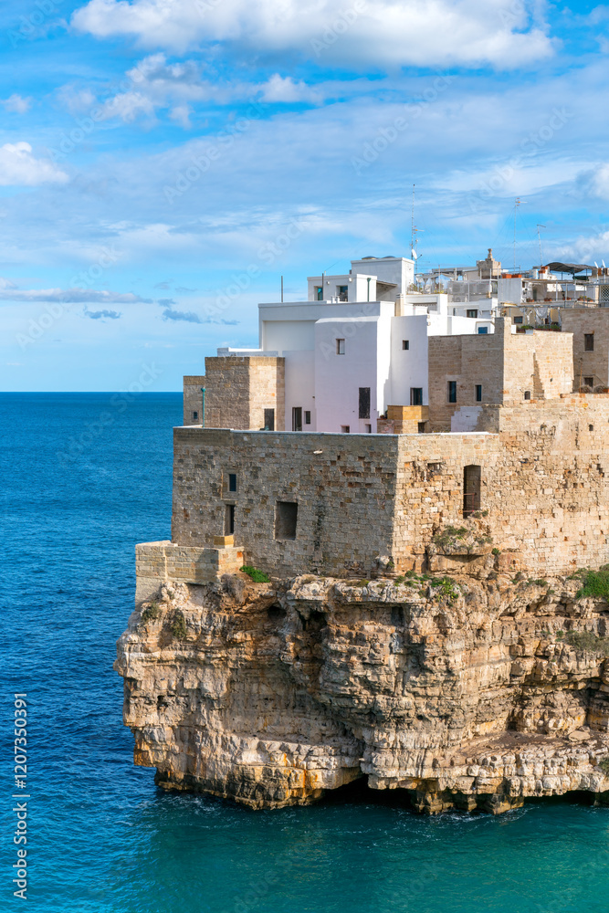 Whitewashed Houses on Cliffs in Polignano a Mare, Puglia Whitewashed Houses on Cliffs in Polignano a Mare, Puglia