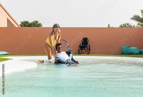 Inclusive pool fun, wheelchair accessibility in water from surf camp