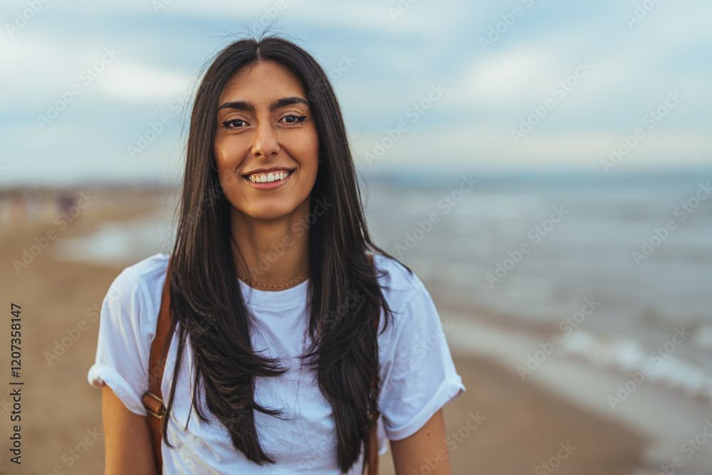 Smiling Woman in Casual Attire Enjoying a Relaxing Day at the Beach Smiling Woman in Casual Attire Enjoying a Relaxing Day at the Beach