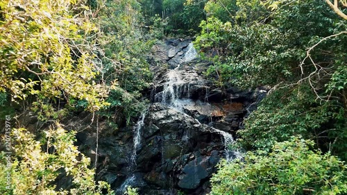 Close-Up of a Cascading Waterfall in a Forest 