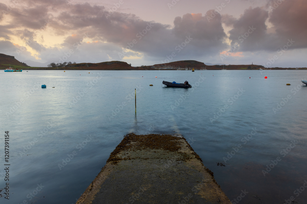 Fototapeta premium View from a jetty looking over the Sound of Kerrera with the Island of Kerrera in the distance. Oban, Argyll and Bute, Scotland, UK.