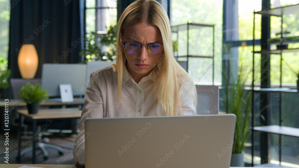 Caucasian female business girl manager worker ceo executive businesswoman at office desk focused woman working typing project on laptop computer online work project startup chatting with clients email Caucasian female business girl manager worker ceo executive businesswoman at office desk focused woman working typing project on laptop computer online work project startup chatting with clients email