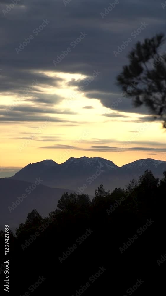 Landscape, zoom in to the snowy mountains at sunset Landscape, zoom in to the snowy mountains at sunset