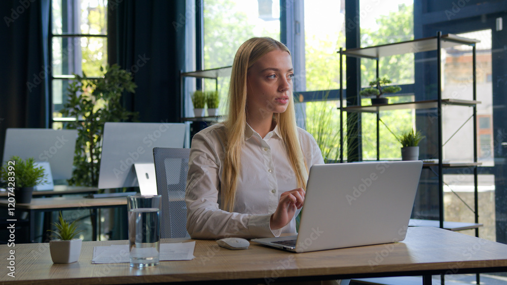 Female businesswoman Caucasian girl woman executive manager employer CEO working with laptop computer consider business project startup idea young student studying online planning strategy at office Female businesswoman Caucasian girl woman executive manager employer CEO working with laptop computer consider business project startup idea young student studying online planning strategy at office