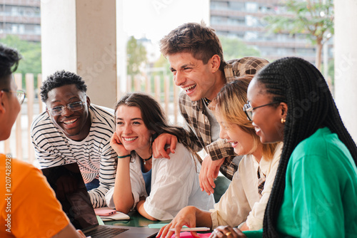 Big group of teenage students talking together sitting on a university campus bench. Young friends having fun on a social gathering outside. Classmates having a conversation on a friendly meeting