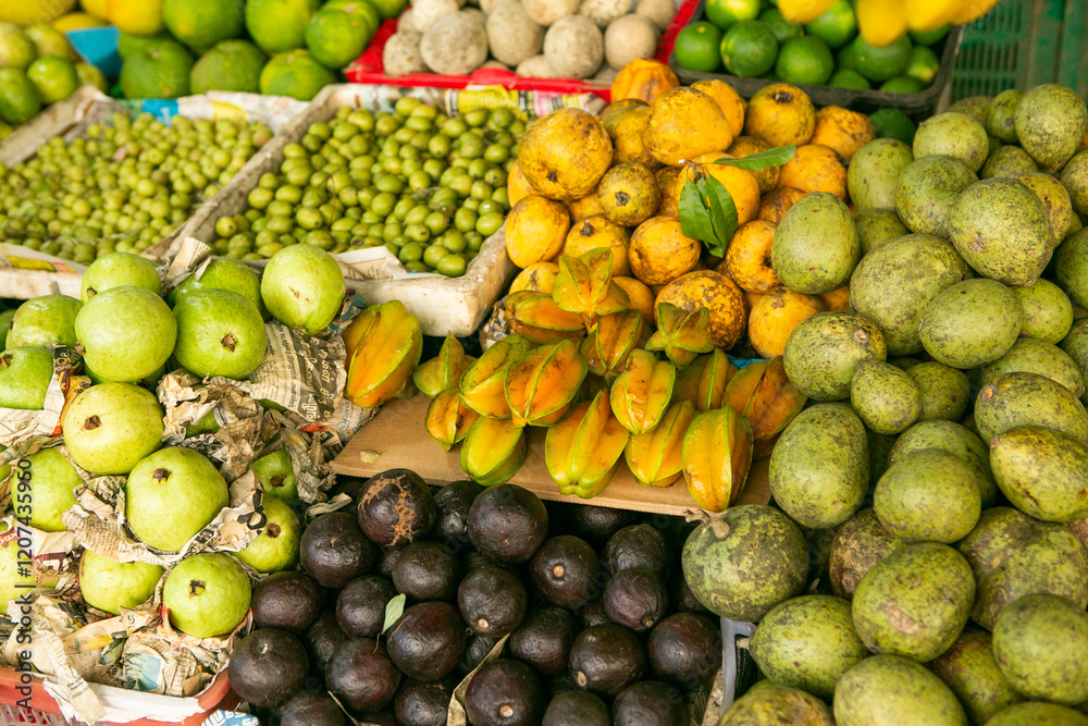 Fruits and vegetables at a local market in Sri lanka. Tropical or exotic fruits on the street in Asia. Fruits and vegetables at a local market in Sri lanka. Tropical or exotic fruits on the street in Asia.
