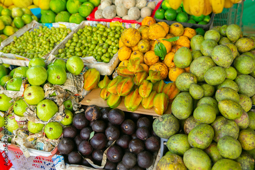 Fruits and vegetables at a local market in Sri lanka. Tropical or exotic fruits on the street in Asia.