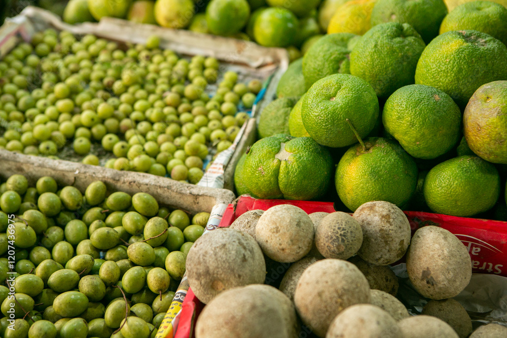 Fruits and vegetables at a local market in Sri lanka. Tropical or exotic fruits on the street in Asia. Fruits and vegetables at a local market in Sri lanka. Tropical or exotic fruits on the street in Asia.
