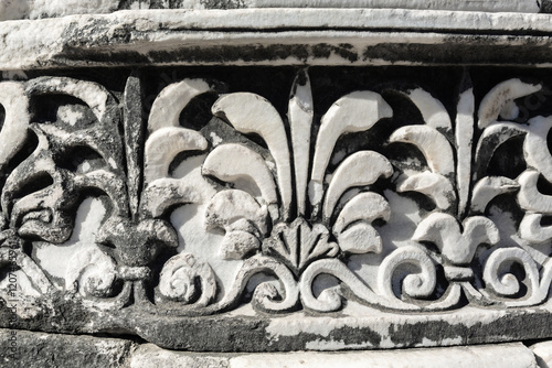 Intricate stone carvings at the Temple of Apollo in Didyma, showcasing classical Greek artistry and architectural details. Didim, Aydin, Turkey (Turkiye) photo