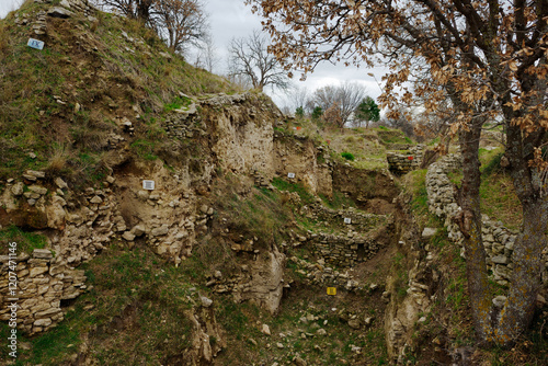 Troy, Anatolia, Turkey. Labelled exposed sections of the ancient ruins showing habitation levels I to IX dating from 3000 BC