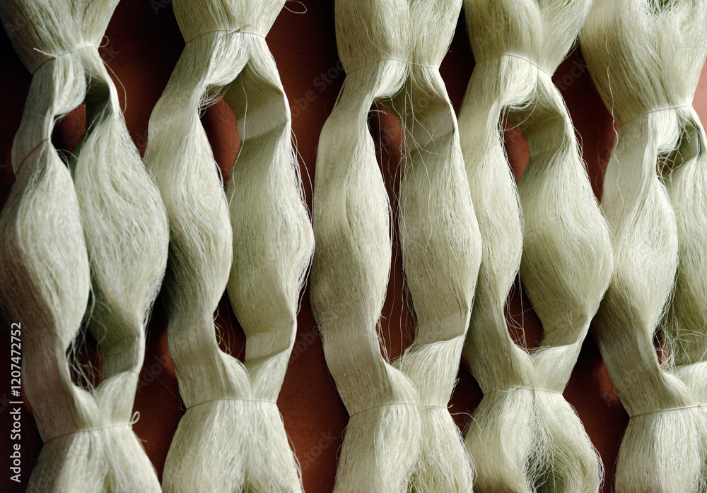 Hanks skeins of silk thread fibre yarn used in manufacture of quality Turkish carpet. Cankurtaran Carpet Centre, Denizli, Turkey