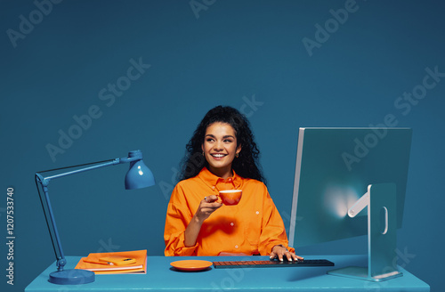 Receptionist working at desk with computer and keyboard