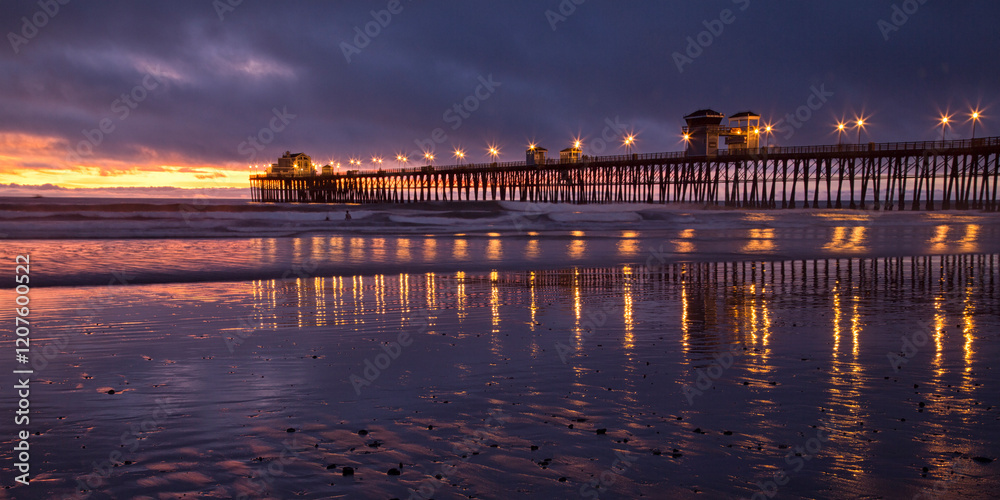 Fototapeta premium sunset reflection with ocean pier