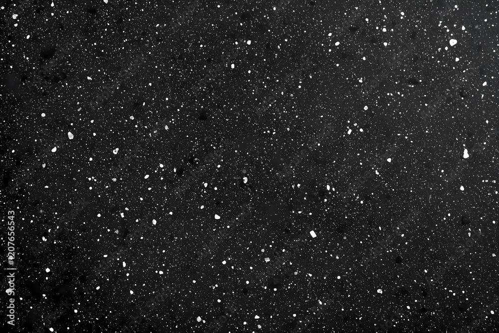 Fototapeta premium Black background with small white specks