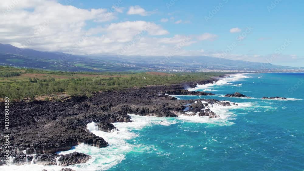 Aerial view on the chasm at Etang-Salé in the south of Reunion island, with a turquoise sea and its corals Aerial view on the chasm at Etang-Salé in the south of Reunion island, with a turquoise sea and its corals
